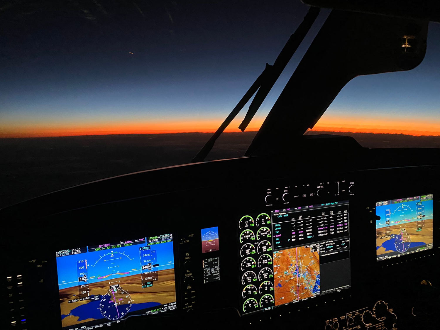 airplane cockpit flying twilight