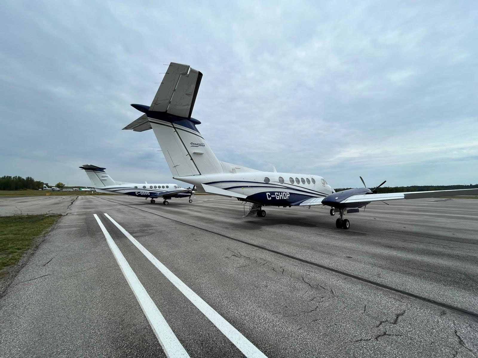 airplanes on runway parked