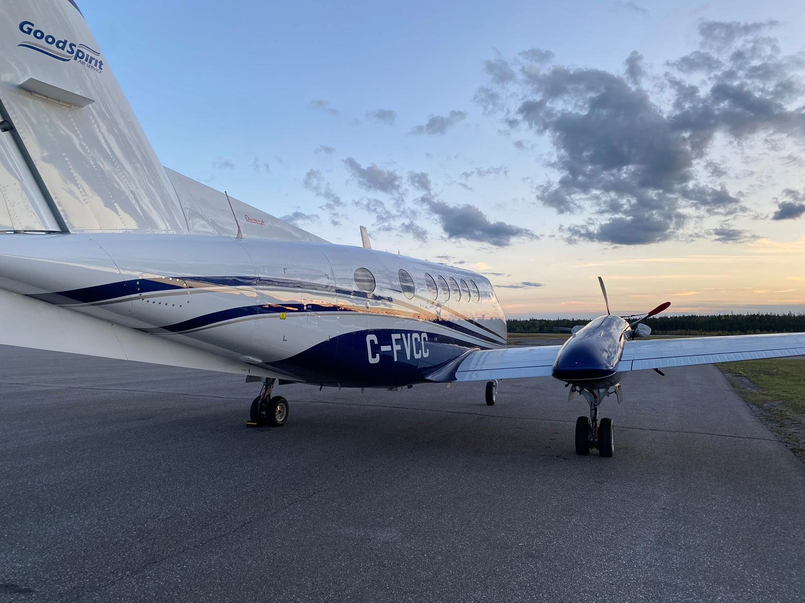 parked airplane at sunset
