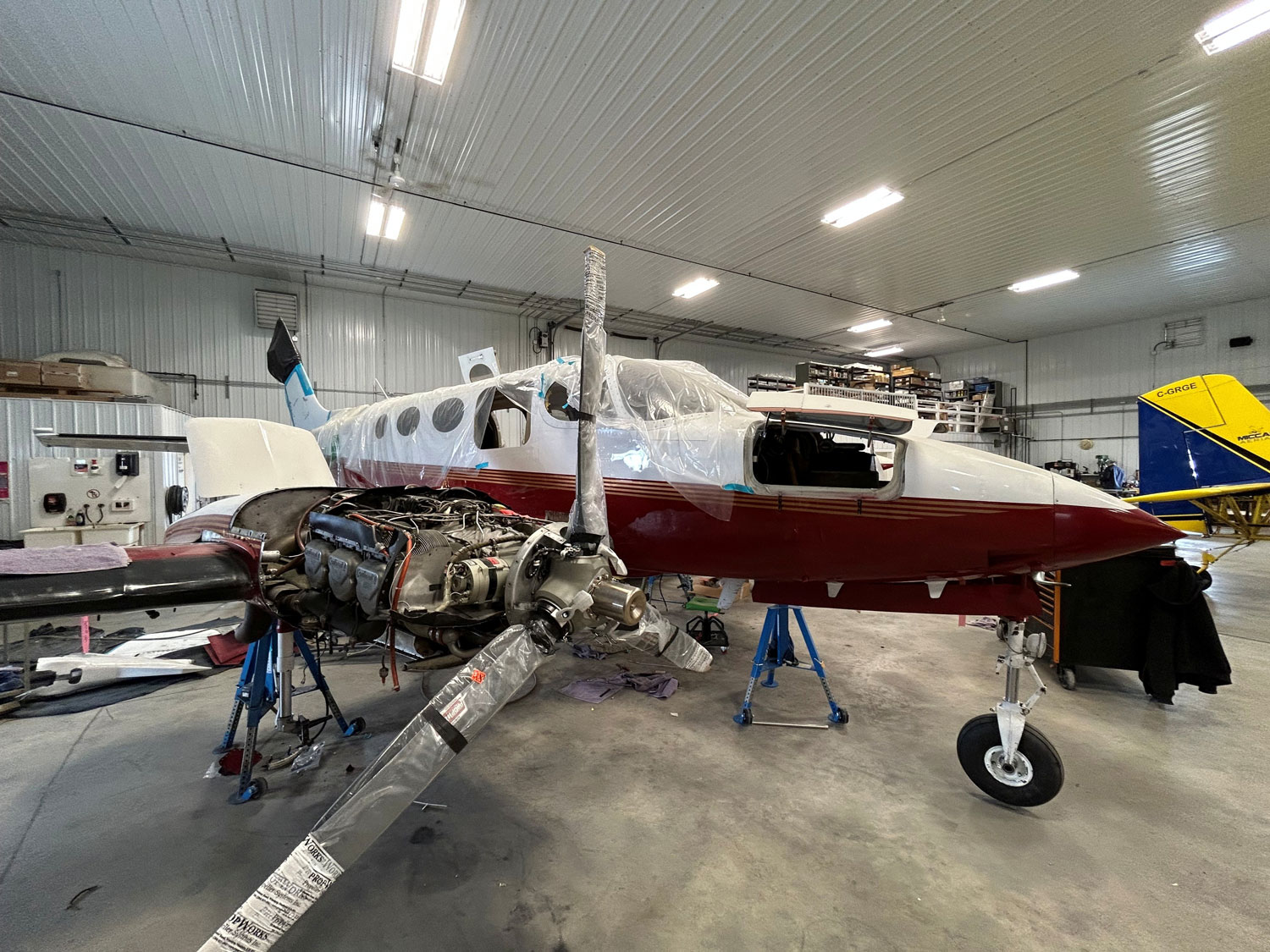airplane being mechanically worked on